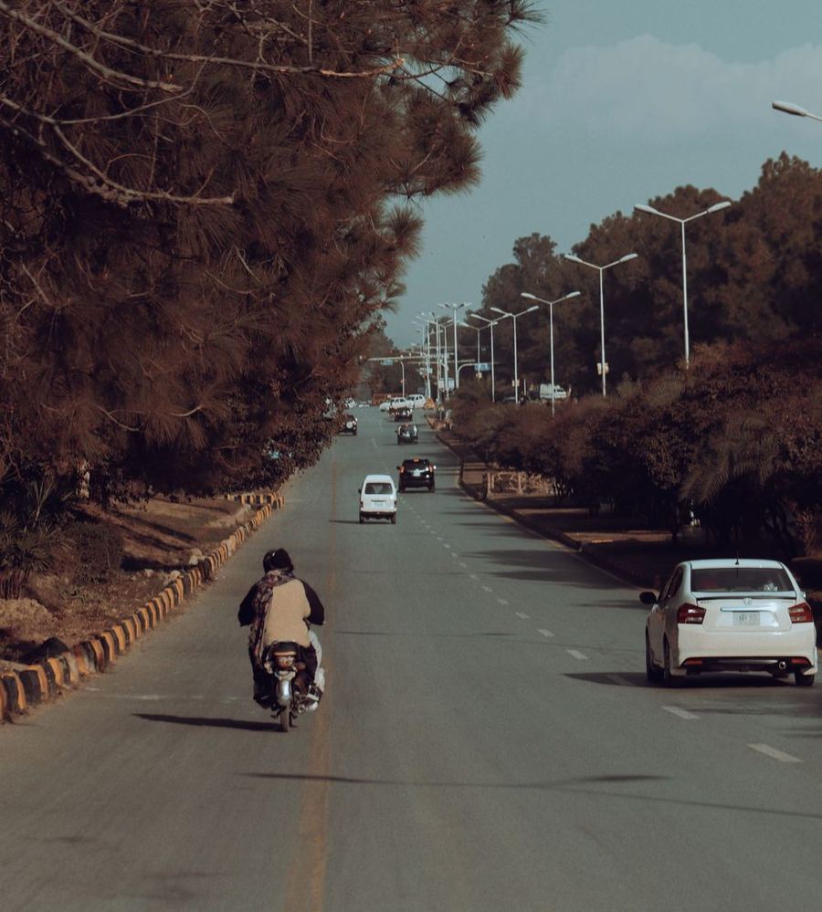 A road in Islamabad running toward the Margalla hills