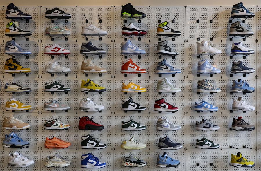 Wall of sneakers in the REKIX store